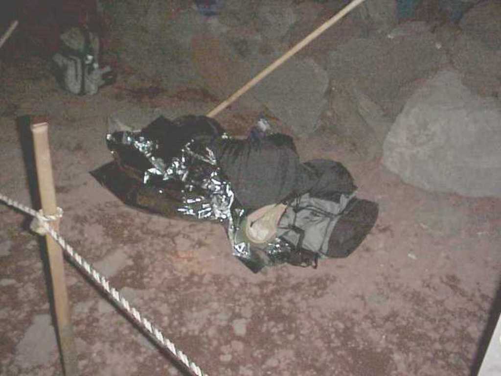 Mike sleeping in foil wraper